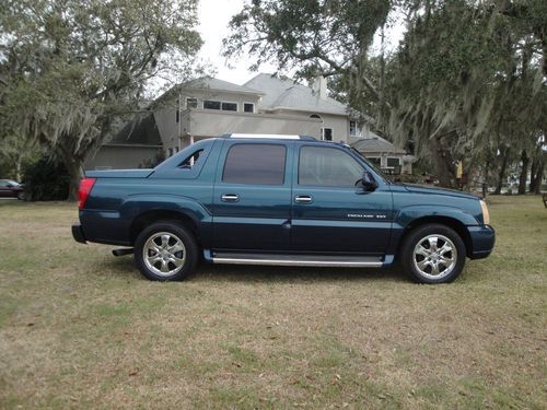 Cadillac escalade ext adult owned since new! lotsa pics!  look!