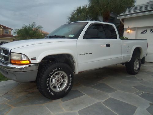 5.2 v-8 cold a/c power windows and locks. good tires. motor and trans strong.