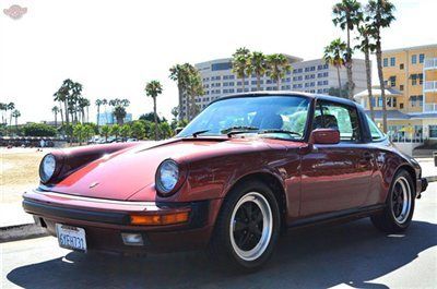 '86 911 targa, cranberry. 85k miles. books, very clean.....