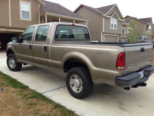 Crew cab, 4x4, short box, at, ac, am/fm/cd, brown with tan vinyl seats