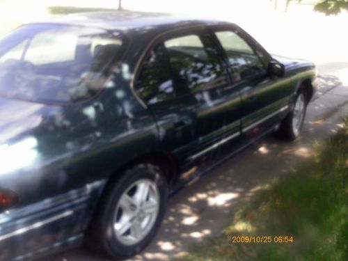 1996 pontiac bonneville- clean,straight, 3.8 w/ 180k, needs tranny, great parts