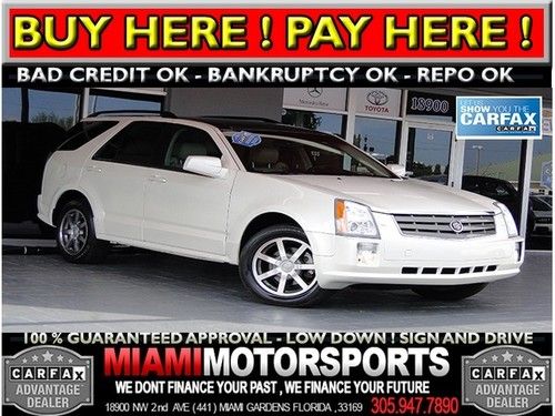 We finance '04 suv navigation leather panoramic sunroof and much more...