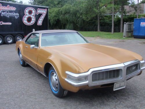 &#039;69 toronado, fully optioned, gold w/tan interior, unique chrome wheel option