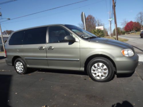 2005 kia sedona ,dual rear sliding doors