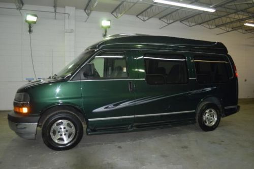 Midwest high top conversion van, rear sof/bed, entertainment, priced right $5975
