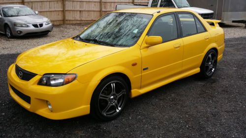 Yellow mazda mp3 5 speed 4cyl