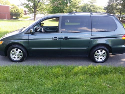No reserve_clean_cold a/c_3rd row_loaded_leather_alloys_power doors_heated seats