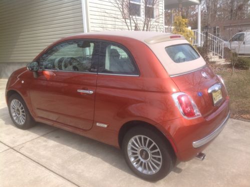 Rare copper color ,ivory interior , 6 speed automatic, luxury leather package