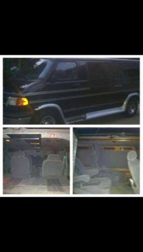1998 dodge ram b 1500 van, black with gray trim, black and gray interior.
