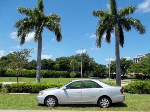 2002 camry clean title accident free leather cold air  low cost delivery