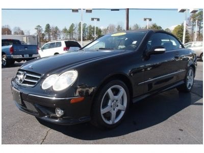 Convertible excellent condition navigation v8 rain sense wipers turn signal mirr