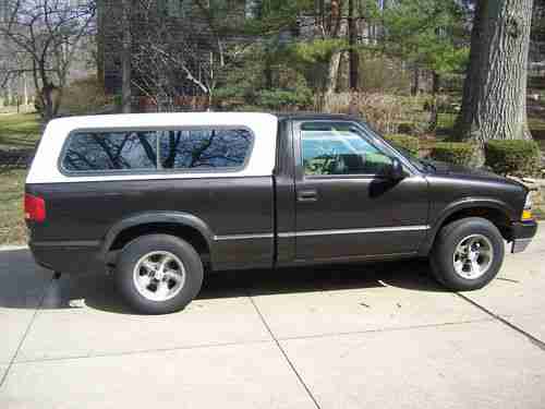1998 Chevy S-10 with truck cap.  4 cylinder, AC. Runs good, good tires, brakes., image 3