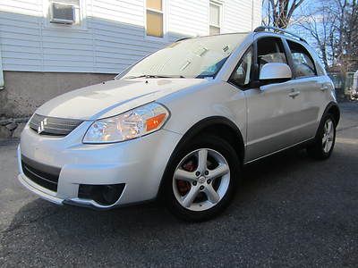 2007 suzuki sx4**all wheel drive**gas saver**low miles**warranty