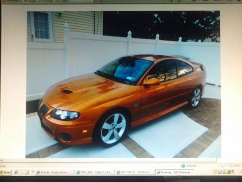 2006 gto  only10,700  miles limited production  new new  no reserve base coupe