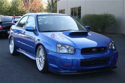 2004 subaru impreza wrx sti. only 54k miles. sitting on brand new 19's.