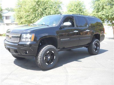 Leathered up ltz ,this lifted suburban is sweet,better hurry call bob