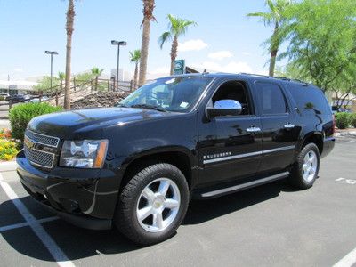 2009 black v8 leather navigation dvd sunroof miles:79k 3rd row suv