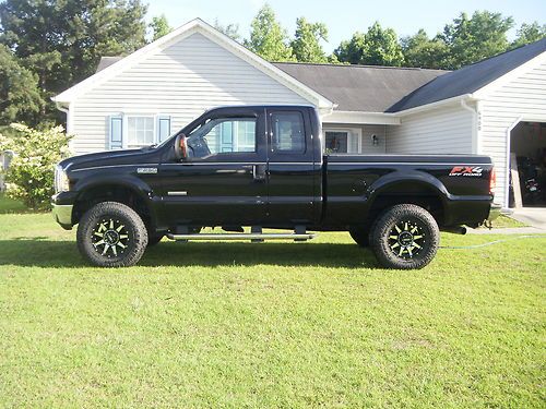 Black fx-4 f-250 4x4 extended cab shortbed