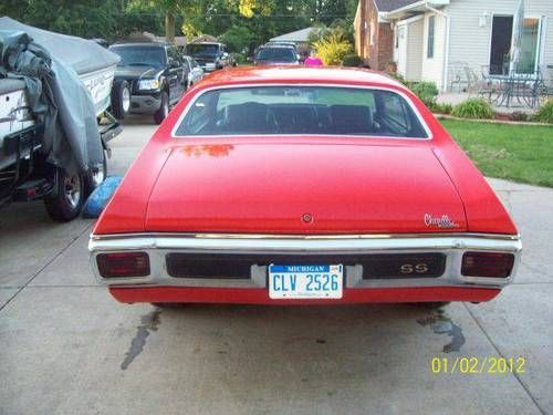 1970 ss chevelle, body in great condition, color hugger orange, black interior.