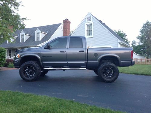 Lifted 2004 dodge ram 1500 slt - 4 door - under 32,000 miles - clean!