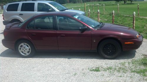 2002 saturn sl2 base sedan 4-door 1.9l 174k miles, runs, clean title, needs work