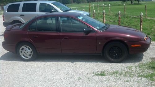 2002 saturn sl2 base sedan 4-door 1.9l 174k miles, runs, clean title, needs work