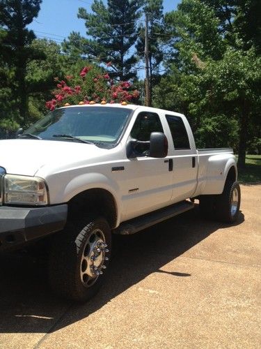 2006 ford f350  four wheel drive dually lifted.