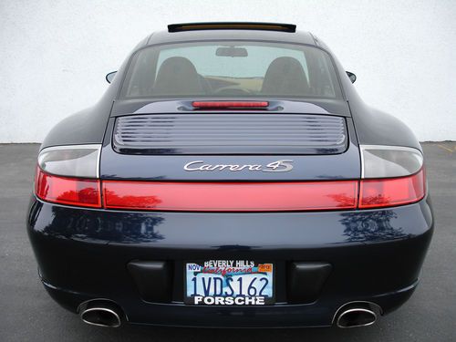 Porsche dealer maintained records widebody awd showroomcondition seat warmr" 930
