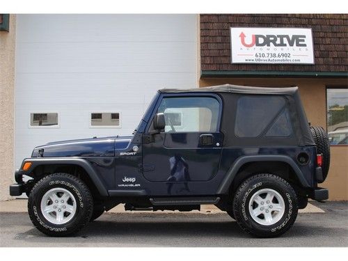 37k miles sport 4x4 4.0l v6 cold a/c running boards new tires soft top automatic