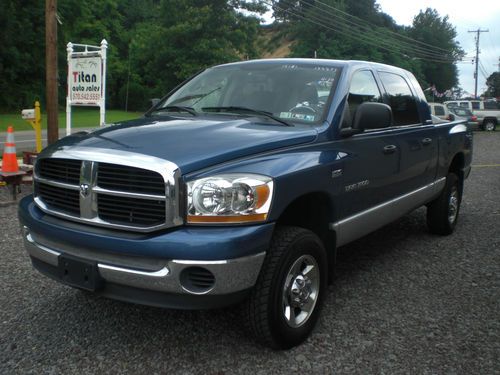 2006 dodge ram 1500 slt 4x4 quad cab mega cab hd suspesion we finance everyone