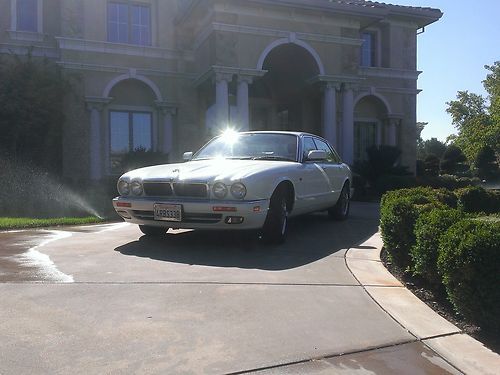 Clean low miles 1997 white and beige jaguar xj6 4.0 kelley blue book is $6500