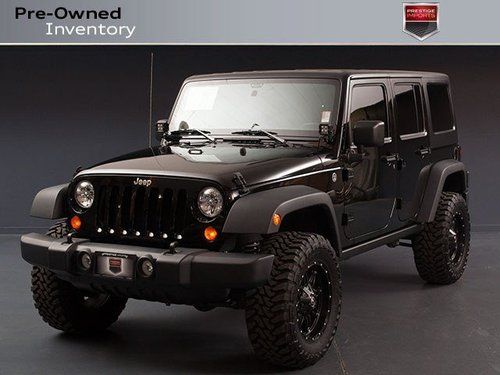 2012 jeep rubicon wrangler unlimited *9k miles*black* super nice!