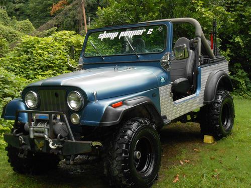 1983 cj-7 jeep!  detroit locker, one pc axle, winch, super swampers!