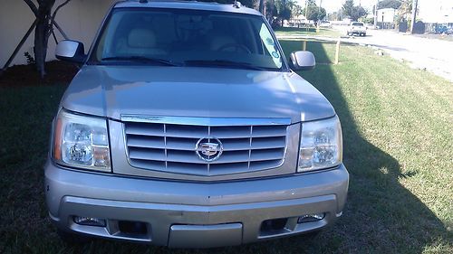 Cadillac escalade low miles save big