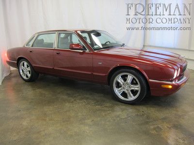 Power sunroof, climate control, heated seats, multiple c.d. changer