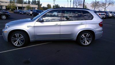 2013 bmw x5 m w/only 5k miles. silverstone mettallic w/black perf. full leather.