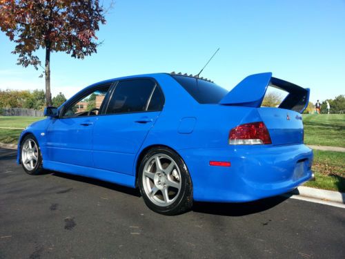2003 blue mitsubishi lancer evolution sedan 4-door 2.0l