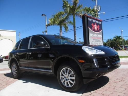 09 black awd cayenne suv -leather + wood steering wheel -navigation