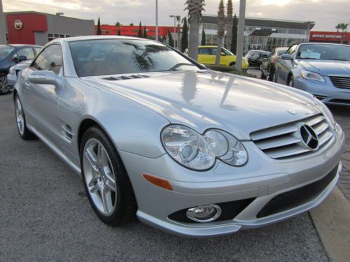 Low miles amg sport pkg hard top convertible leather automatic great condition!