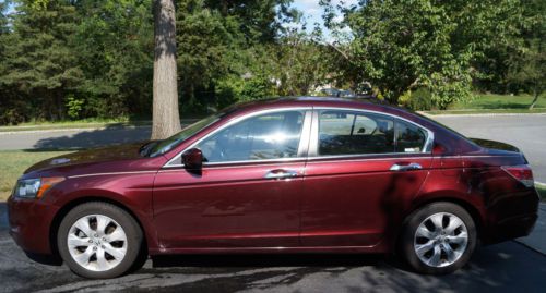 2009 honda accord ex-l v6 in san marino red with 60,500 miles and fully loaded.