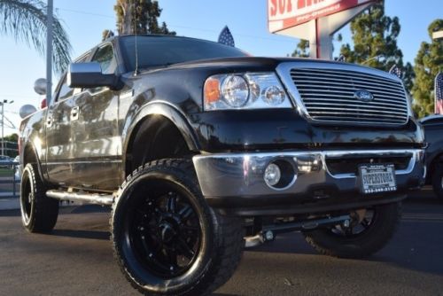 Crew cab lariat 4x4 black on black new lift 20in prem wheels oversized tires