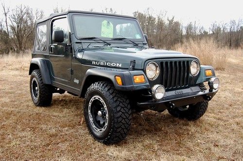 Very cool 2004 jeep wrangler rubicon, 4 wheel drive, brand new soft top,newtires