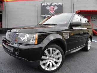 Supercharged strut*black/black*rear ent*heated seats*20"s*nav*lux*we finance*fla