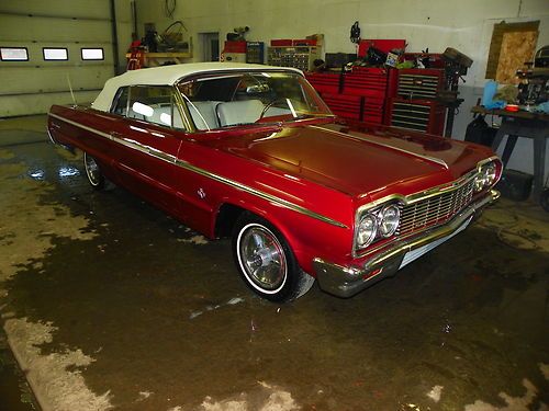 1964 impala ss convertible 4sp, very nice driver quality 409 badges