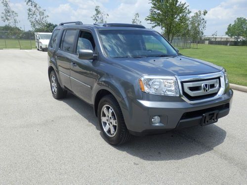 2011 honda pilot touring 4wd. 28k miles. navi. dvd. park assist. free shipping