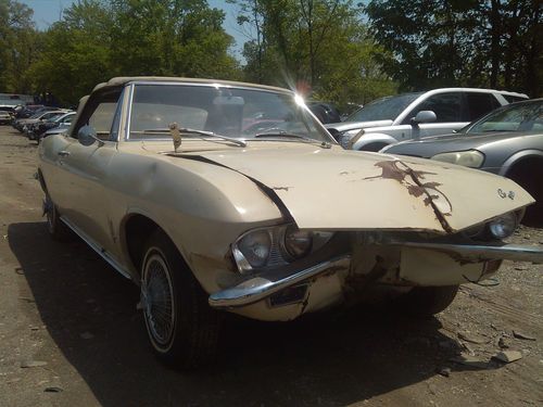 Wrecked 1965 corvair conv. new motor, nice top 54k look at pics