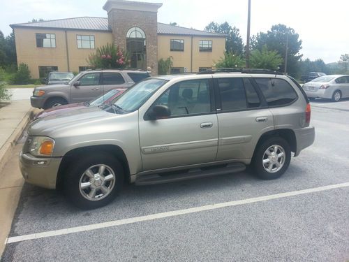 2003 envoy gold color, good shape, new tires