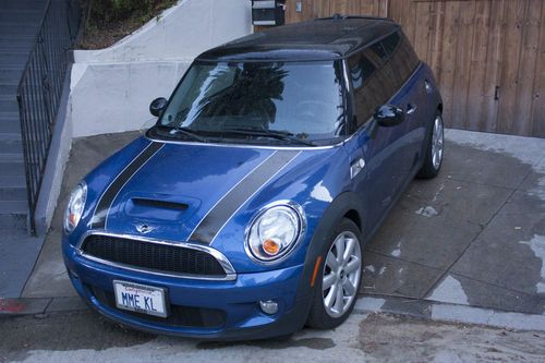 Lightning blue w/black stripes on bonnet. excellent condition. sport package.