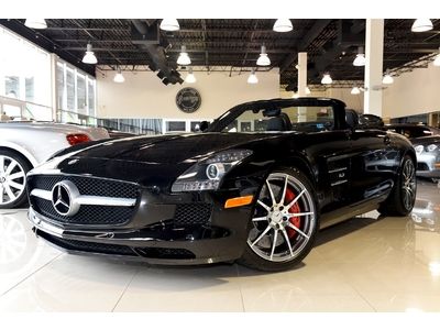 Roadster; original msrp $225,145; carbon fiber packages; obsidian black / black