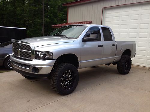 2004 dodge ram 2500 lifted 20" helos on 35's